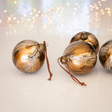 A set of six beautiful marble effect baubles in soft gold and cream.