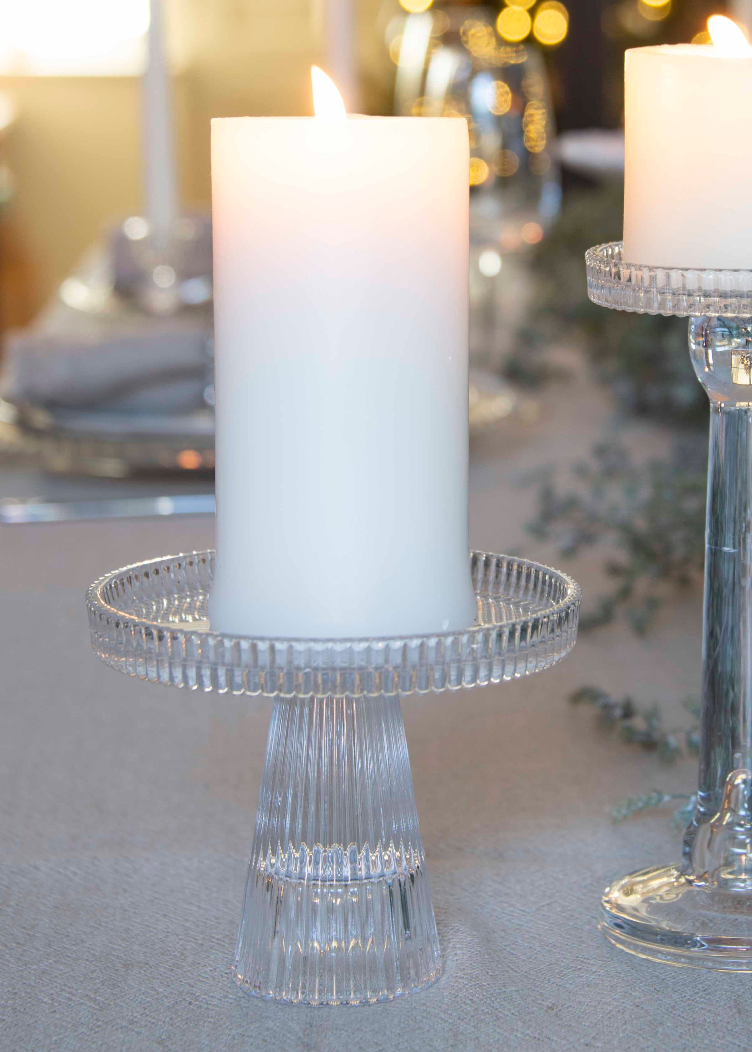 Glass candle holder with wide base