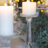 Glass candle holder with wide base