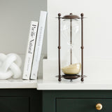 A refined and distinctive decorative white knot crafted from white polyresin. Shown here next to an hourglass