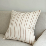 The Luxury Beige Stripe Cushion, crafted from premium cotton, exudes a rustic elegance that adds a touch of luxury to any space.