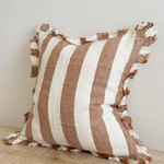 A beautiful linen cushion in a rich rust stripe pattern colour featuring ruffled edges.