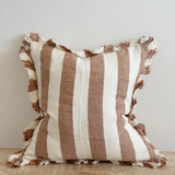 A beautiful linen cushion in a rich rust stripe pattern colour featuring ruffled edges.